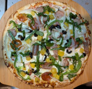 pizza 7-12-25 with basil.jpg