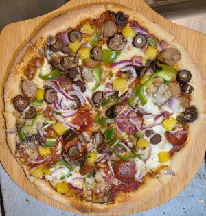 Pizza Jan. 31, 2026 baked on aluminum pan.jpg