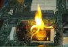 4677611-burning-processor-on-motherboard.jpg 4677611-burning-processor-on-motherboard.jpg